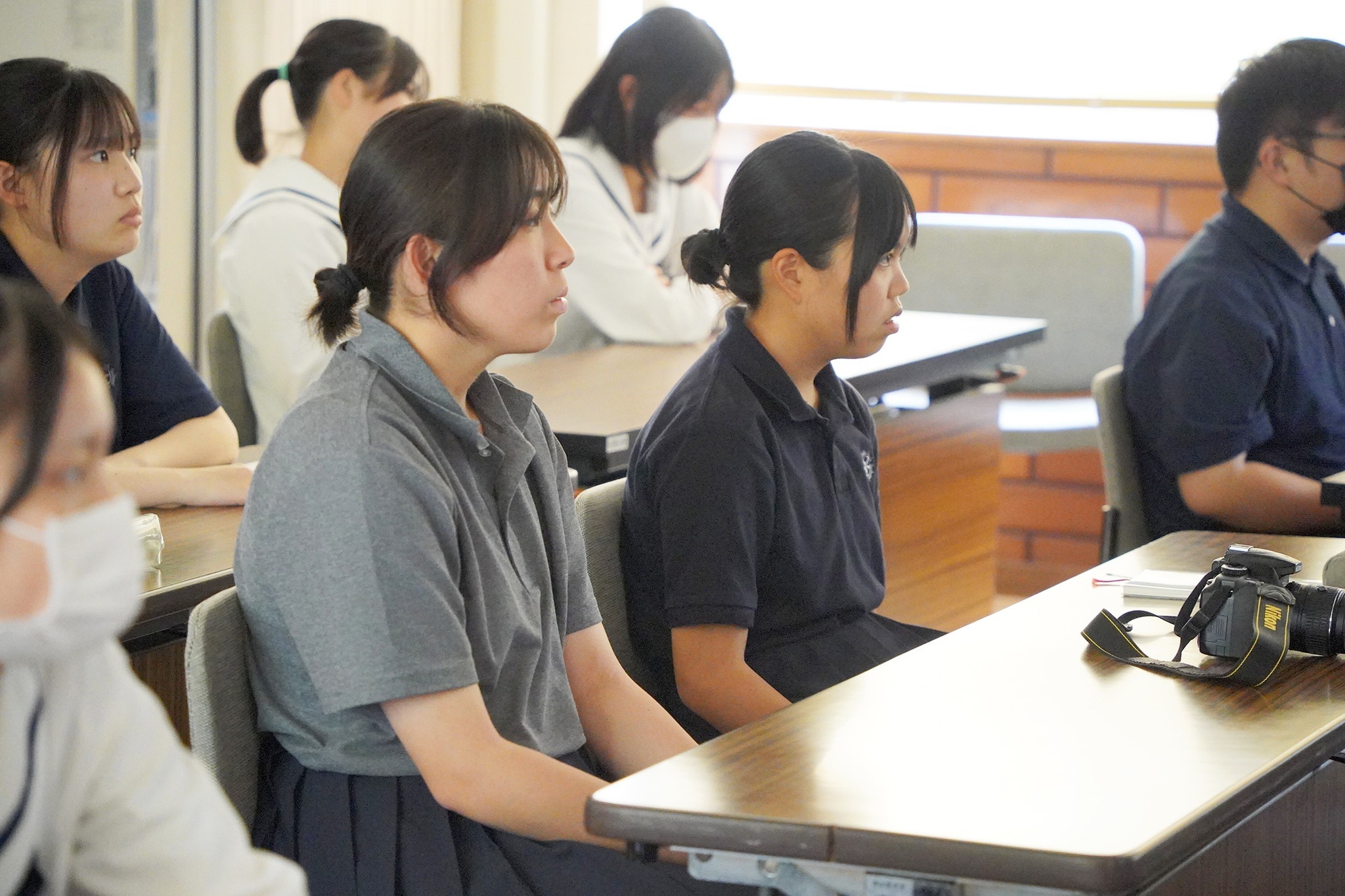 プロの写真家から撮影のコツなどを学びました