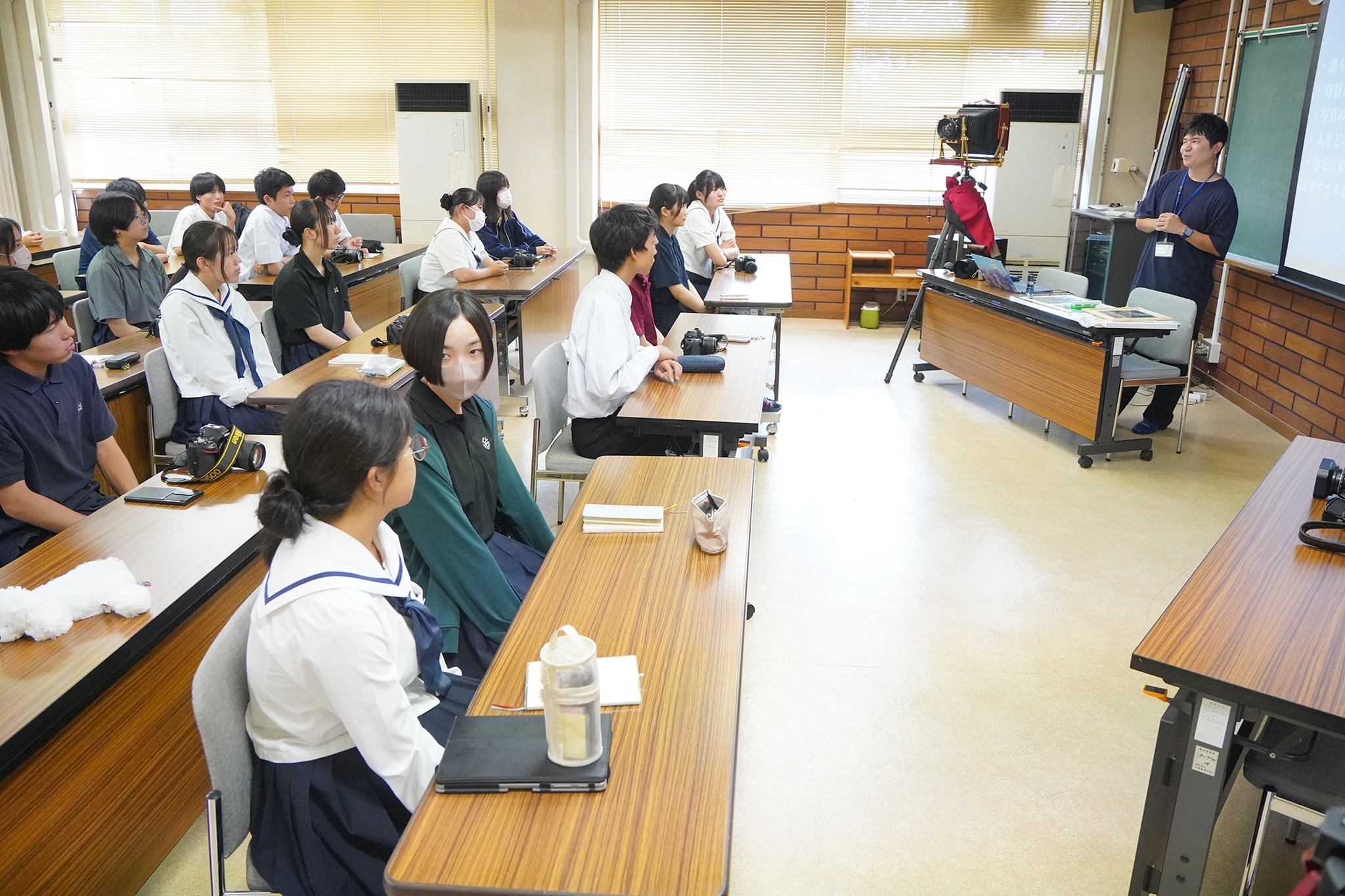 プロの写真家から撮影のコツなどを学びました